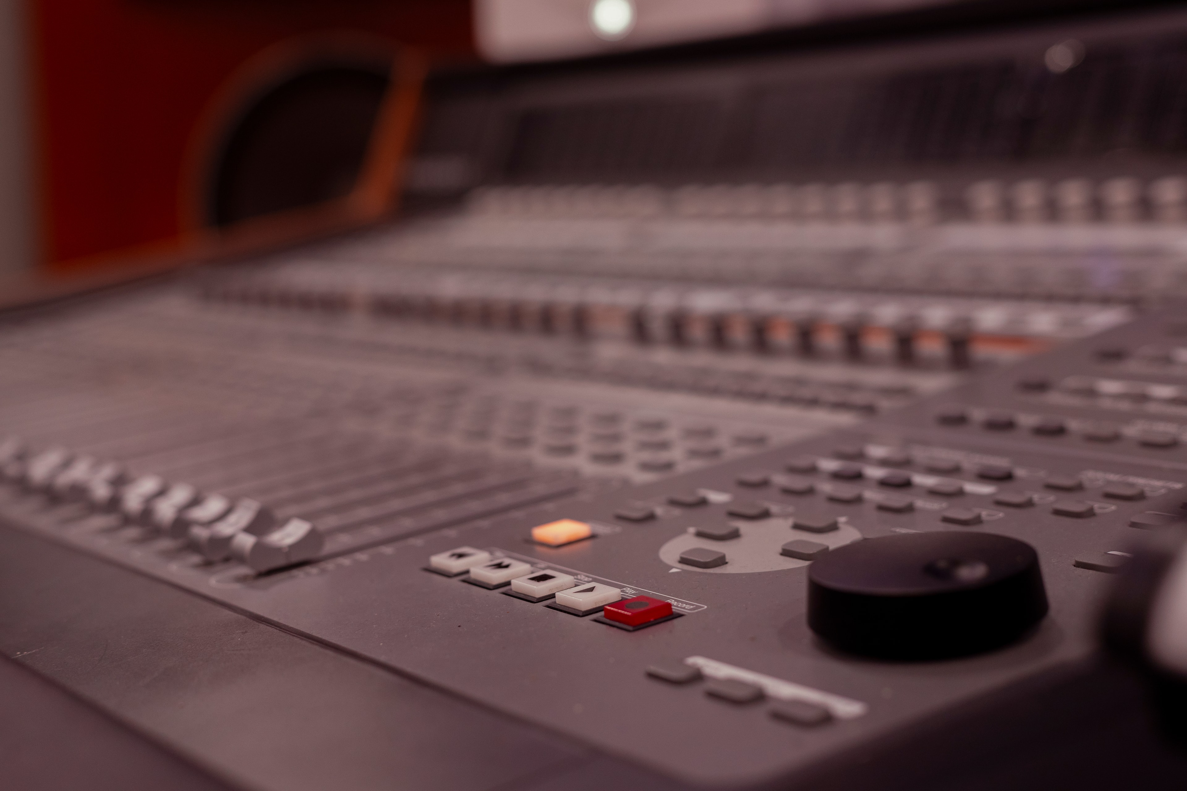 Grammy Room — desk detail with iMac, Yamaha monitor, and PreSonus Central Station